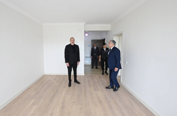 Ilham Aliyev and First Lady Mehriban Aliyeva viewed conditions of 15 multi-apartment buildings in Khojaly city following repair and reconstruction