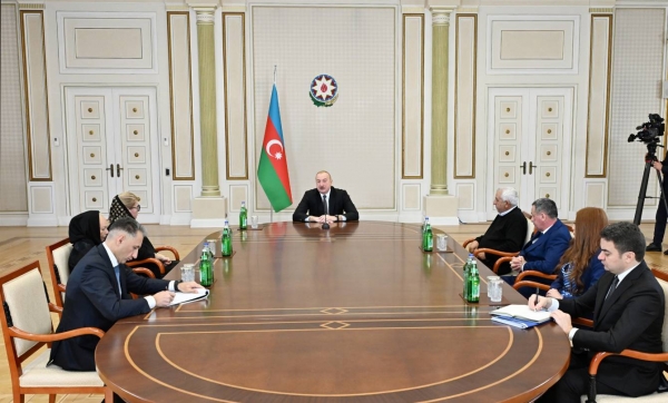 Ilham Aliyev met families of crew members killed in plane crash and surviving flight attendants